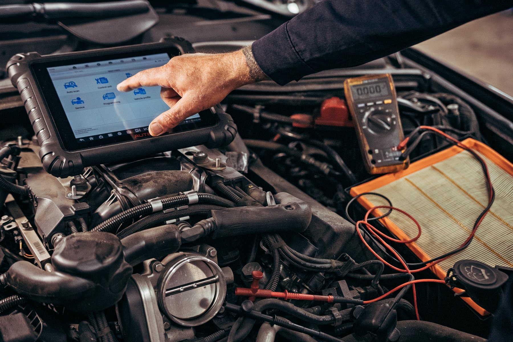 Diagnostic meter and tablet during vehicle testing