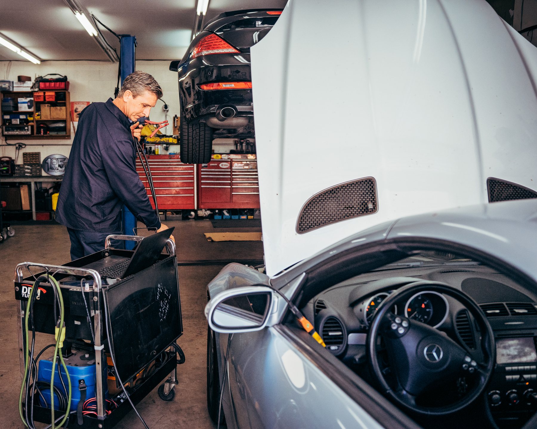 Luke Bennett using diagnostic equipment on a vehicle at Chariot Automotive